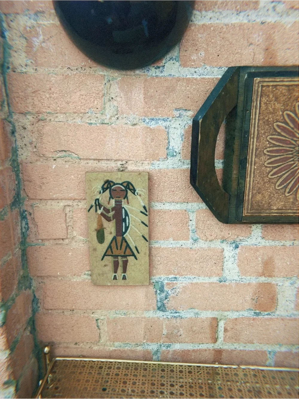 Navajo Native American sand painting of a women figure in geometric shapes